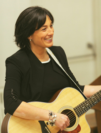 Kim Doron playing Guitar